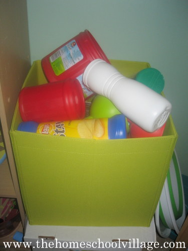 bin of recycleables for sensory play